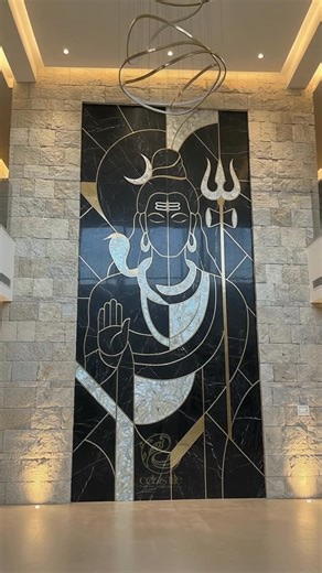 Celes’tile: The home and bath boutique on Instagram: "When divinity takes form in stone, the whole space starts breathing. Shiv Ji, crafted in mother of pearl, marble and brass inlay, an abstract mural that doesn’t just sit on the wall, it transforms the energy of the room. ✨ Custom temple walls ✨ Full-scale murals ✨ Bespoke spiritual artworks Because spaces that hold faith deserve art that holds soul. #Celestile #StoneArt #InlayArt #BrassInlay #ShivJi InteriorDesignIndia ArtThatLives Handcrafte