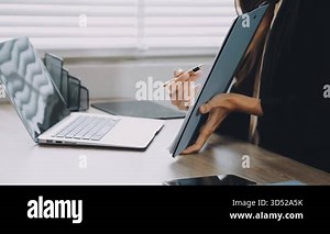 young woman using laptop at home, online education, e - learning concept, close up of hands of young woman working with laptop computer in