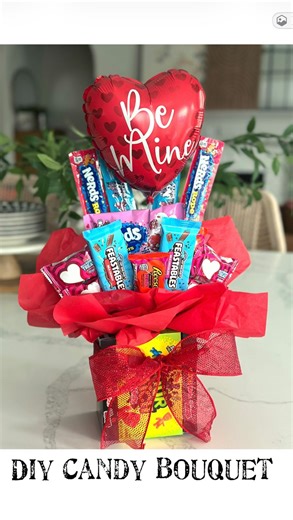 Crisp Collective on Instagram: "Easy DIY candy bouquet...perfect for a last minute Valentine gift!❤️ Comment SHOP for supply links! Use candy of your choice!! I used: 4 boxes of sour patch kids 4 Nerd ropes 1 bag of Nerd Clusters 2 Feastable bars Reese's hearts Mini rice krispie squares A foam block cut in half Tape and a hot glue gun Red tissue paper Ribbon Valentine balloon Directions: Hot glue the 4 boxes of candy to create a vase. Cut your foam block to size and place it in the middle. Tape 