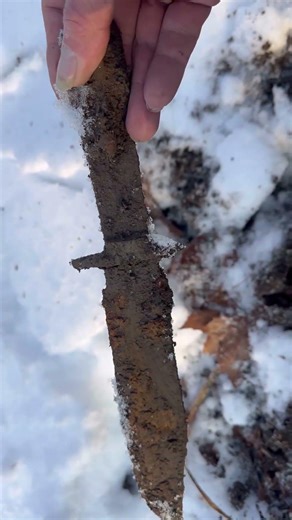 Metal detecting found old knife in the woods in the snow ￼.