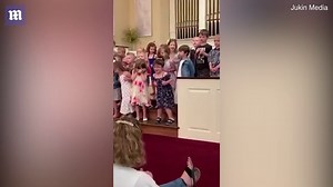 Hysterical moment little girl shows off her moves at graduation