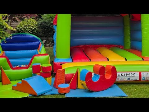 Setting up a bouncy castle, ball pool and soft play set