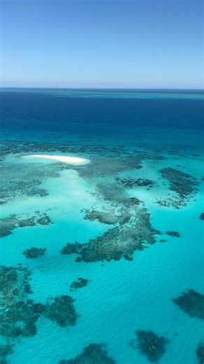 POV: You’re flying over the Great Barrier Reef, and it’s even more breathtaking than you imagined. Discover helicopter scenic flights with @nautilusaviation via link in bio. | Nautilus Aviation