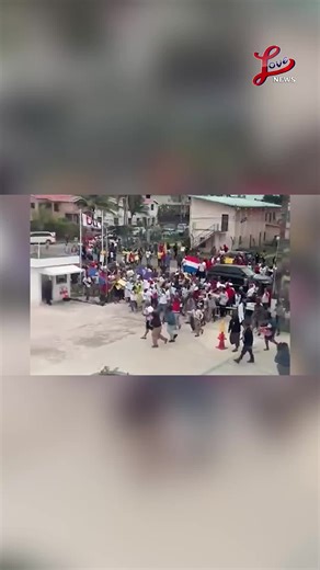 Tensions boiled over in Belize City today as a protest against a proposed business acquisition turned confrontational outside Belize Telemedia Limited. More than a hundred demonstrators, led by opposition figures and joined by union members, forced their way into the BTL compound on St. Thomas Street amid mounting concerns over the proposed acquisition of SMART. Police were deployed, tempers flared, and the protest unfolded. Richard Herbert was at the protest and filed the following report. #Bel