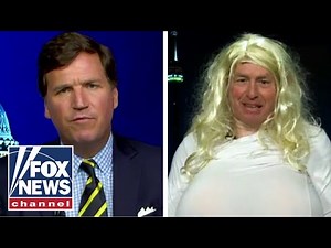Tucker goes one-on-one with commentator who wore giant prosthetic breasts to make a point