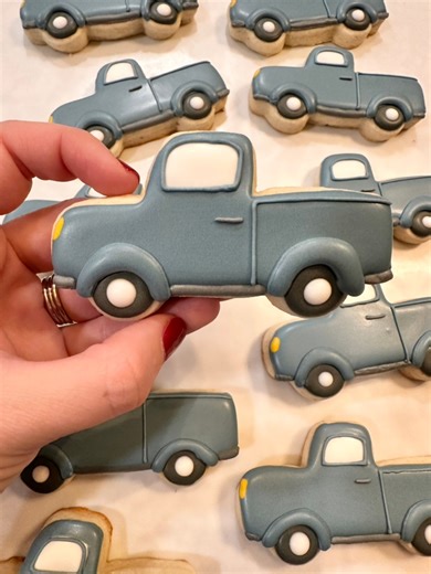 🛻🤩Blue pickup trucks coming right up. These little beauties were custom made for a kid who is all about trucks and the louder the better. Cookies that match a personality are my favorite kind of project. If someone in your life has a favorite thing, I can turn it into something sweet. 🔗Link in comments for pricing & easy order form #ReelsTrending #ReelsInspiration #ViralReels #ExplorePage #TrendingNow #CreativeReels #HandmadeTreats #EdibleArt #CookieArtist #DecoratedCookies #RoyalIcingCookies