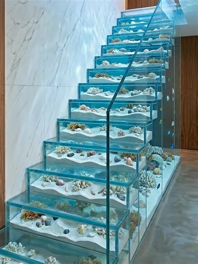 This glass staircase ocean transformation is insane 🌊 Watch how a transparent staircase turns into a luxury underwater style design using sand, shells and water. So satisfying. #satisfyingvideos #transformation #luxuryhome #staircase #interiordesign #designinspo #hometransformation #viralvideo #fyp #foryou