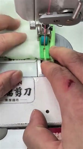 sewing beautiful decorative light green patterns manually using machine