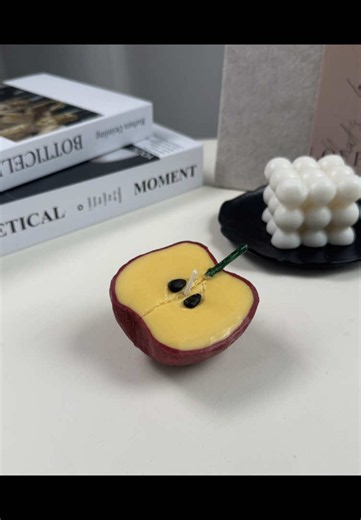 Freshly sliced.🍎✨ Every detail is handcrafted to look just like the real thing. It may look like an apple… But it’s actually a candle.🕯️ Link in bio #handmadecandles #candletok #candlemaking #asmr #usa