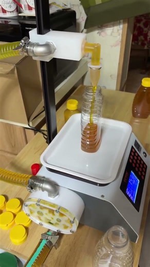 Automatic bottling machine in use