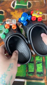 4.3K reactions · 971 shares | My son asked for actual Monster Jam “shoes” The mini Monster Jam trucks are the perfect size for Croc charms!  #diy #monsterjam #crocs #easter #easterbasket #spring #monstertrucks #asmr #satisfying #momlife #toddler #trending #fyp | Meaka Garlow | Facebook