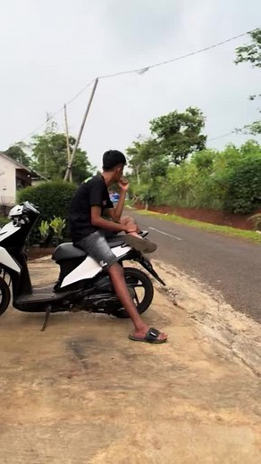 Outdoor Scooter Duo Interaction on a Sunny Day