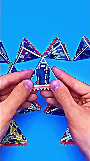 Folding origami shapes into geometric structures! 📐 #OrigamiShapes #GeometricStructures