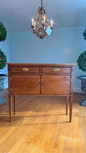 This custom Jefferson Huntboard, crafted in curly maple with walnut inlay, was designed and built to fit its home perfectly. Custom sizing allows us to honor traditional forms while tailoring each piece to how it will be lived with. A timeless piece, thoughtfully made. | Owen Suter's Fine Furniture