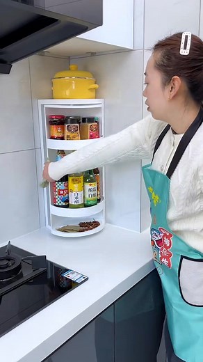 1.6K views | This rotating shelf is a great addition to any corner of the kitchen. It saves space and can store bottles and jars of all sizes #storage #convenient | MYK | Facebook