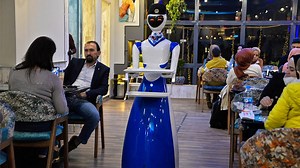 Robot waiters are bringing this Iraqi city into the future