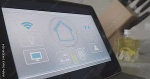 Light switched on using smart home app on the tablet screen