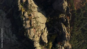 Overhead drone shot of the natural rock formations of Belogradchik Fortress which used to be an ancient Roman stronghold on the slopes of the Balkan Mountains in Vidin province, Bulgaria.