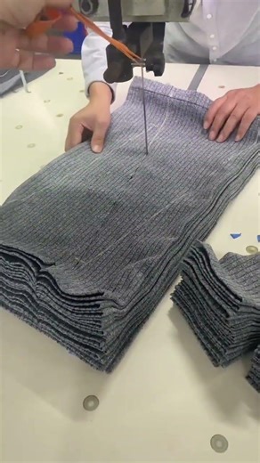 the process of cutting cloth using a machine in the factory #shorts