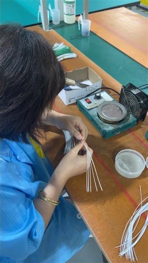 The process of tinning the ends of wires