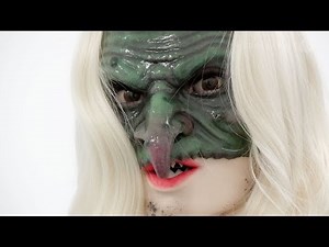 Beautiful animatronic robot dances in front of mirror