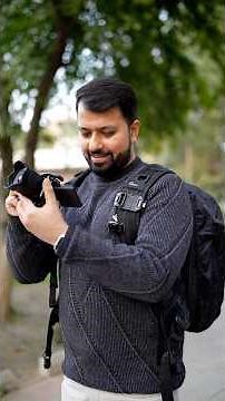 Walking and shooting made easy with a backpack camera mount