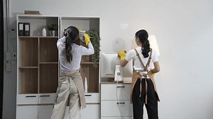 Two Asian Housekeepers Wearing Aprons Rubber Stock Footage Video (100% Royalty-free) 3599884125 | Shutterstock