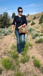 1.7K views · 705 reactions | Original hand tooled, hand painted, handmade Clair Kehrberg leather bag featuring a highland cow. This is a style I made a few years ago, but I really like the shape. What do y’all think?? #clairkehrbergmaker #throwback #westernstyle #cowgirlstyle | Clair Kehrberg ~ Fine Leather Art | Facebook
