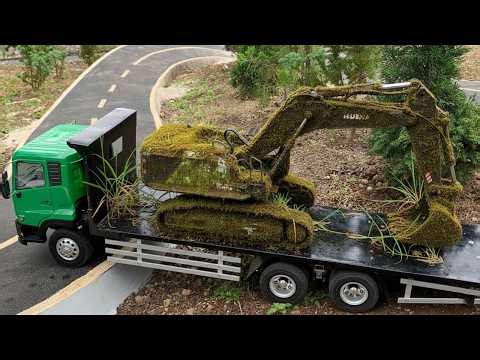 Truk Oleng Wahyu AbadI Terjebak Dalam Lumpur Saat Bawa Muatan Kayu Di Derek Truk Ud Quester