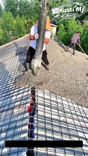 Efficient Concrete Pouring Technique on Sloped Surfaces.