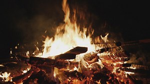 Large log fire burning outside - Free Stock Video