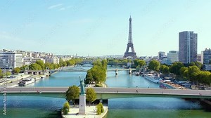 PARIS, FRANCE - MAY, 2019: Aerial drone view of Eiffel tower and Seine river in historical city centre from above.