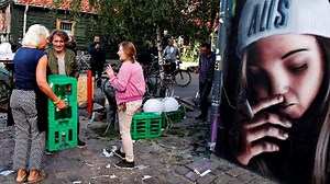Residents of Copenhagen's Christiania demolish cannabis huts after shooting