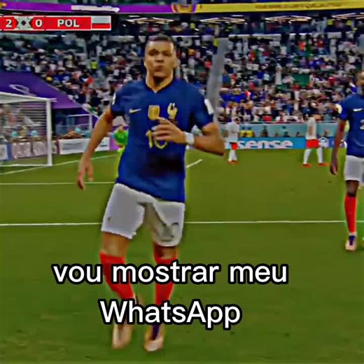 French Soccer Player Celebrates Goal in Packed Stadium