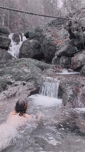 Swimming in a Serene Natural Waterfall Pool