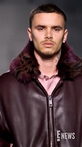 Romeo Beckham walks for Burberry in London Fashion Week