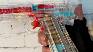 Watch shell ejection toy pistol with mag & darts on Amazon Live