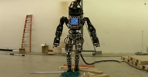 Atlas humanoid robot takes wobbly steps over obstacles