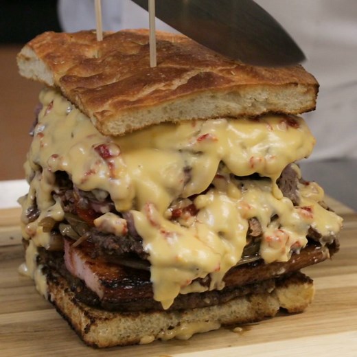 13M views · 57K shares | This 8-pound sandwich is made with five kinds of meat and costs $375. | Business Insider | Facebook