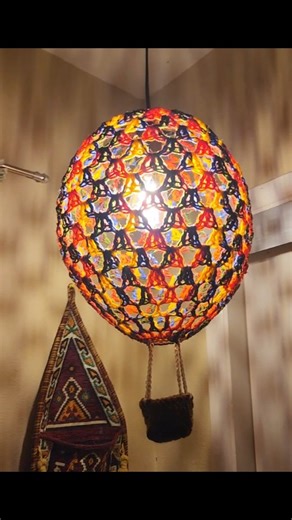 I've been wanting to make this hot air balloon lamp since I first saw it on tiktok. What do you think? #Crochet #hotairballoons | Katy Rickman