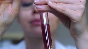 Scientist doing chemical experiment, super slow motion, shot at 240fps