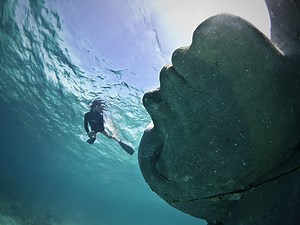 Ocean Atlas: A Massive Submerged Girl Carries the Weight of the Ocean