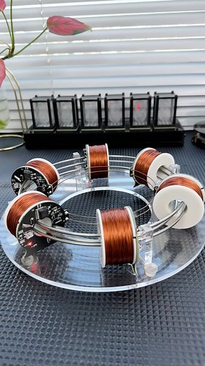 Check out this mini - particle accelerator model! It’s a fascinating piece of science - inspired craftsmanship. Just like in a real - life particle accelerator, where multiple coils work in sequence to give particles a boost, this model mimics that concept with its copper - wound coils. The precision and design are truly eye - catching. It’s not just a model; it’s a glimpse into the amazing world of particle physics. Who else is as intrigued by the wonders of science as I am? #ParticleAccelerato