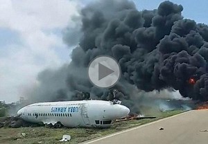 Fokker 50 breaks off a wing on landing and flips over - Video