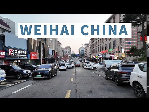 Walking in the city center of Weihai, Shandong, China from day to night