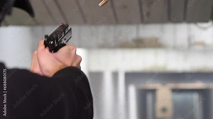 Shooting at a target from a CZ SP 01 pistol in shadow