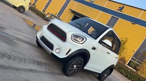 KEYU Candy M5 4 Wheel Electric Cars Adults Vehicle pink Electric Micro Car 4 Seat Small Electric Car