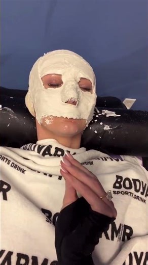 Cameron Brink getting fitted for a face mask