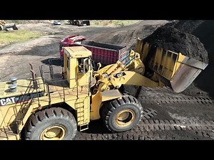 Caterpillar 992C Wheel Loader Loading Trucks With One Pass - Aerial View - S.G.M Melidis - 4k