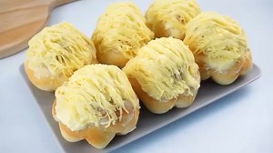 70K views · 668 reactions | CHEESY ENSAYMADA How to make the yummiest soft and fluffy cheesy Ensaymada. Here's what you'll need: 1 large egg 1 cup warm milk (250ml) 1/4 cup sugar (50g) 1 tsp salt (5g) 3 and 1/4 cup all purpose flour (406g) 2 and 1/4 tsp instant yeast (7g) 1/3 cup unsalted butter (70g) Buttercream topping: 1/3 cup softened butter (70g) 1/3 cup icing sugar (50g) Grated cheddar cheese for toppings | Savor Easy | Facebook